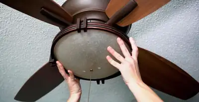 Ceiling fan repair and reinstallation on ceiling mount in Stockton, CA