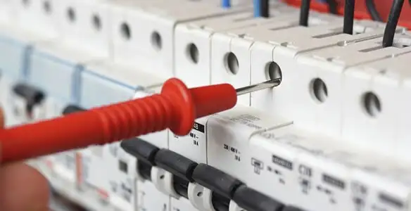 Electrical contractor testing circuit breakers during electrical repair in Lodi, CA