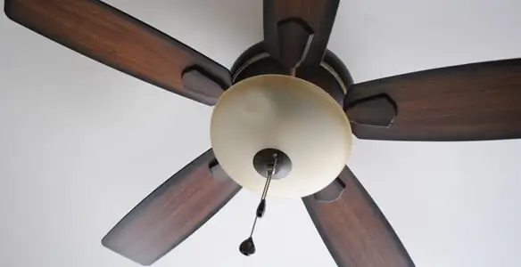 Fully installed ceiling fan with balanced blades and light fixture in Stockton, CA