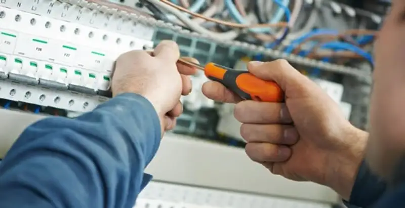 electrical service showing licensed electrician performing electrical panel maintenance and adjustments in Stockton, CA