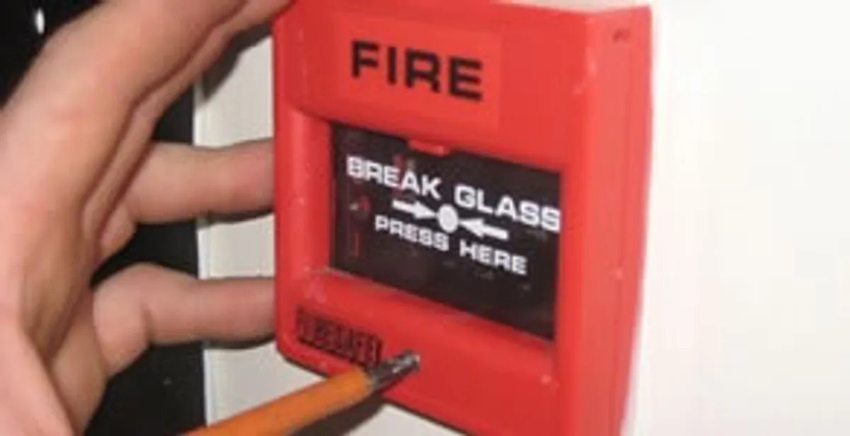 fire alarm installation service showing manual fire alarm pull station installed by licensed electricians in Stockton, CA