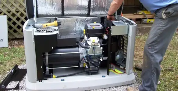 generator installation service showing technician connecting and configuring generator components in Stockton, CA