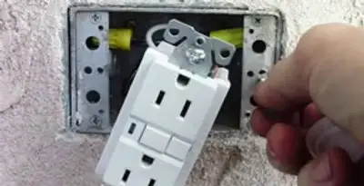 gfci circuits service showing installation of a ground fault circuit interrupter outlet by licensed electricians in Stockton, CA