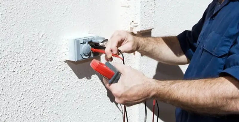 Electrician performing home electrical outlet and wiring inspection in Stockton, CA