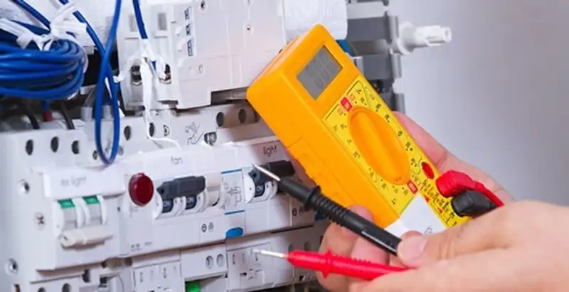 Residential electrician testing home electrical panel for safety and performance in Stockton, CA