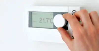 Thermostat installation service with professional adjusting temperature control in Stockton, CA