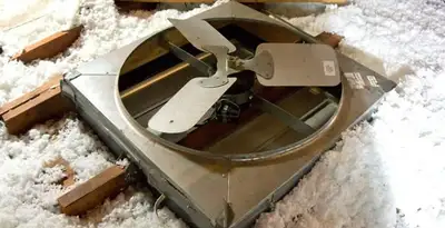 whole house fan installation services with attic-mounted ventilation unit in Stockton, CA
